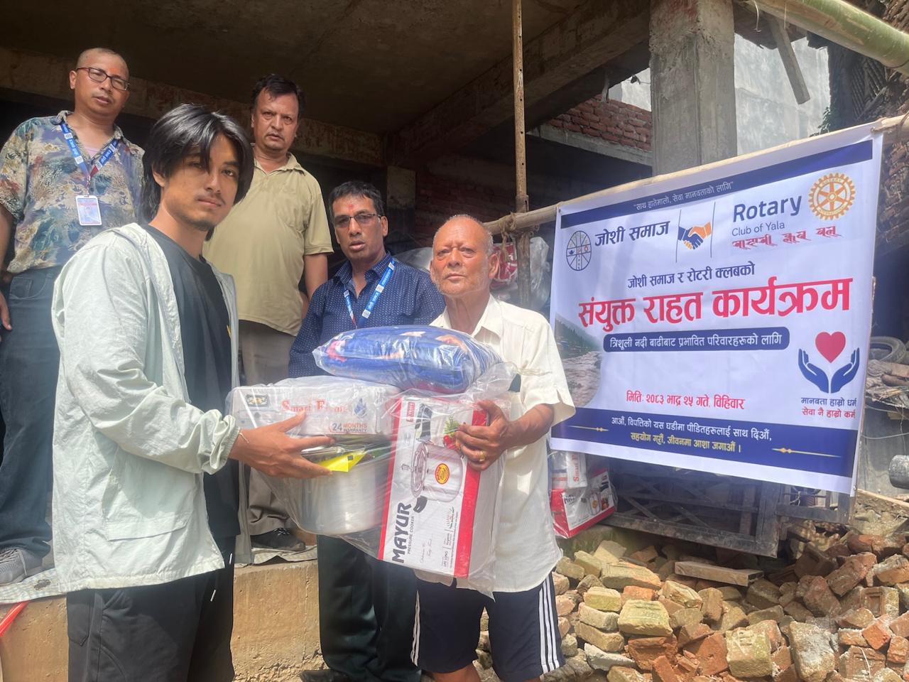 Supporting Flood victims with Untensils together with Joshi Samaj
